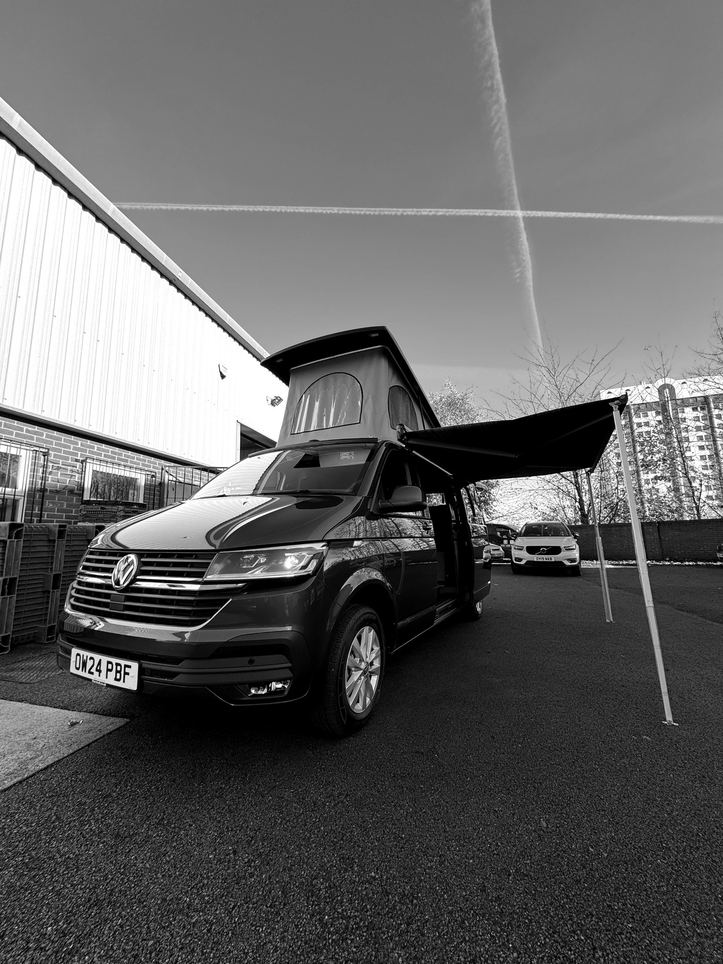 VW Transporter with pop top roof raised